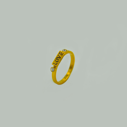 Gold Ring with "LOVE" Inscription and Diamonds